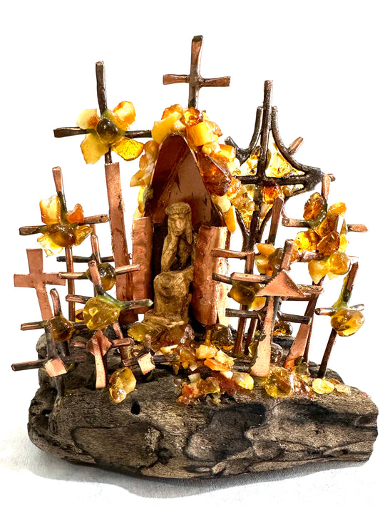 Miniature hills of crosses sculpture