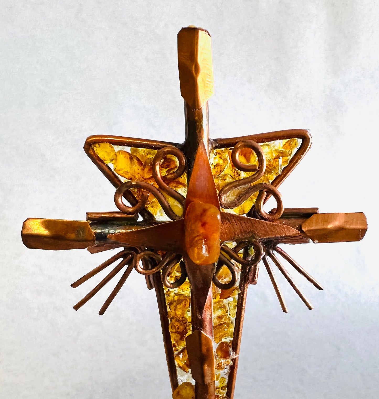 Standing copper and amber cross
